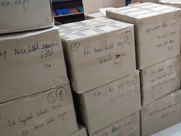 Multiple phone cases are waiting for customer‘s forwarder to pick them up.
